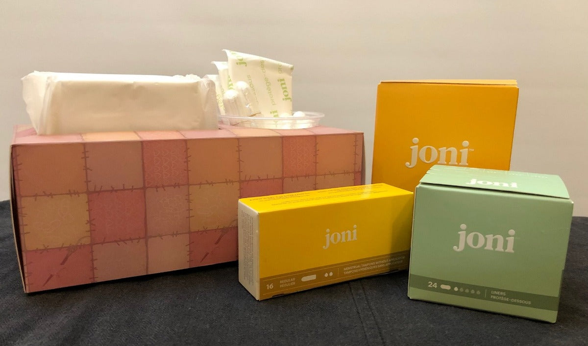 Inclusion Period Box with joni period products on display